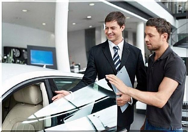 A boy buying a new car.