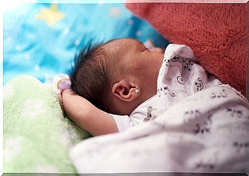 Newborn baby with blanket