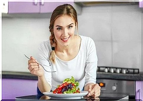 Woman eating a salad